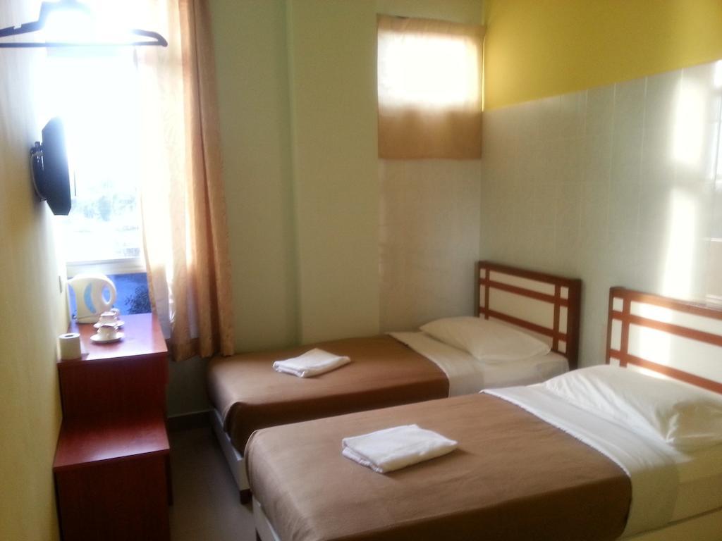 Sakiza View Hotel Мерсінг Номер фото